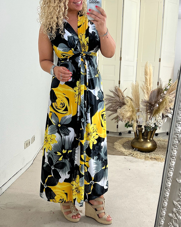 Svea | Robe plissée sans manches avec imprimé floral