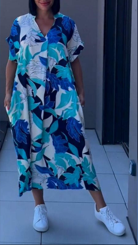 Nia | Robe midi à fleurs avec décolleté en V