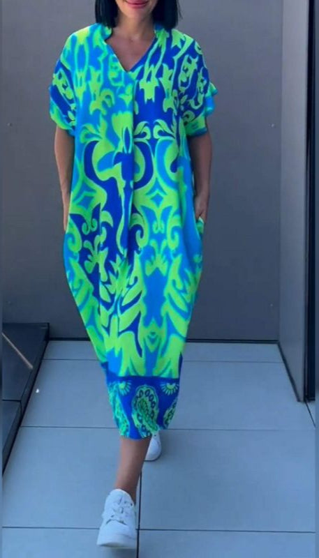 Nia | Robe midi à fleurs avec décolleté en V