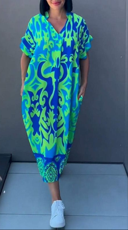 Nia | Robe midi à fleurs avec décolleté en V
