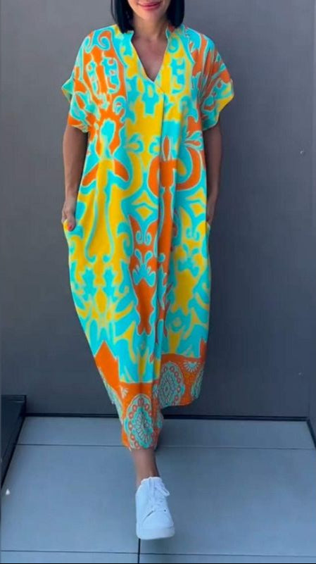Nia | Robe midi à fleurs avec décolleté en V